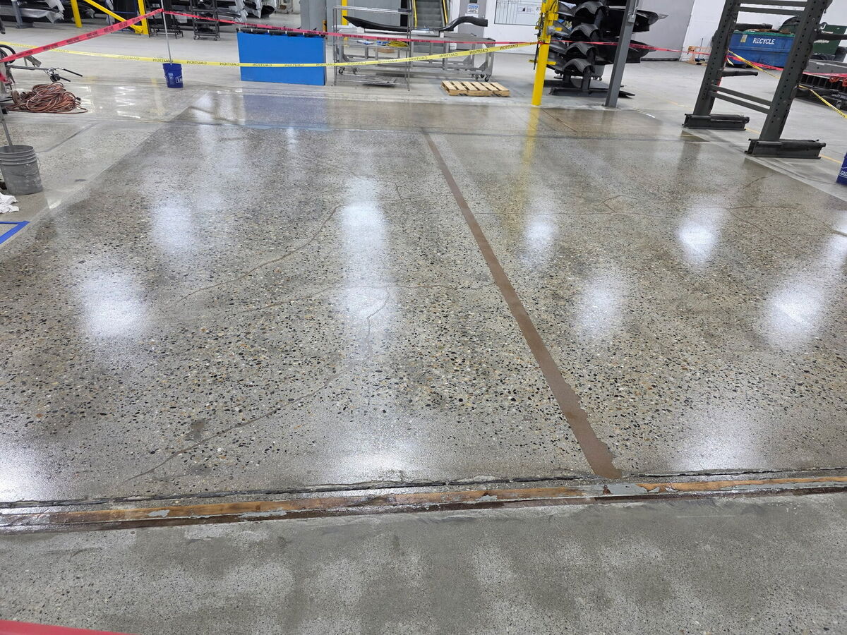 Polished concrete floor detail in a manufacturing facility