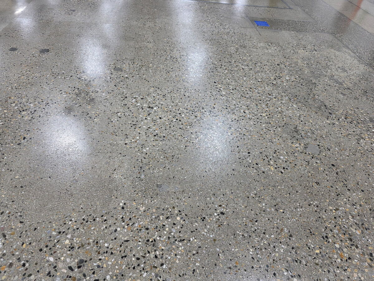 Close-up of polished concrete floor with exposed aggregate